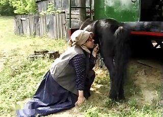 Little dark horse sucked by ranch zoophile