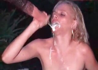 Sexy blonde enjoying horse's cock